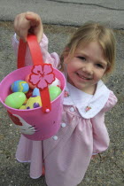 Festivals, Religious, Easter, Young Girl, Sarah Bleau hunting for eggs, Keene, New Hampshire, USA.