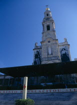 Portugal, Beira Litoral, Fatima, Candle shape incense burning in front of the main church.