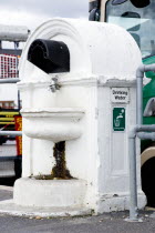 England, West Sussex, Bognor Regis, Free drinking water tap on the promenade beside the beach.