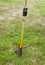 Climate, Weather, Measurements, Thermometer for measuring ground temperature being removed from a meter long tube at the Bognor Regis weather station.