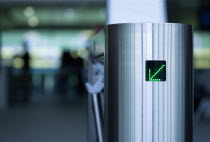 Ireland, County Dublin, Dublin City, Ballsbridge, Lansdowne Road, Aviva Stadium Stainless steel Turnstile at entrance with green LED arrow pointing to the left.