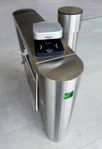 Ireland, County Dublin, Dublin City, Ballsbridge, Lansdowne Road, Aviva Stadium Stainless steel Turnstile with electronic card reader for reading tickets at entrance with green LED arrow pointing to t...