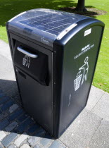 Ireland, County Dublin, Dublin City, Solar powered rubbish compactor on the campus of Trinity College university.