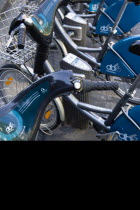 Ireland, County Dublin, Dublin City, Dublinbikes bicycle sharing scheme bikes parked and locked at stands at a station in the city centre.