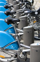 Ireland, County Dublin, Dublin City, Dublinbikes bicycle sharing scheme bikes parked and locked at stands at a station in the city centre.