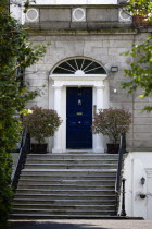 Ireland, County Dublin, Dublin City, Blue Georgian door at the top of steps in the city centre south of the Liffey River.