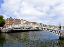 Ireland, County Dublin, Dublin City, The 1816 cast iron Ha Penny or Half Penny Bridge across the River Liffey.