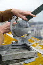 Climate, Weather, Measurements, CampbellStokes sunshine recorder or Stokes sphere on the top of the tallest building in Bognor Regis used by weather observers to monitor the hours of sunshine with ob...