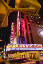 USA, New York, Manhattan, The Art Deco Radio City Music Hall on 6th Avenue and 50th Street illuminated at night.