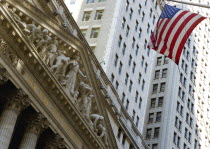 USA, New York, Manhattan, The New York Stock Exchange building in Broad Street beside Wall Street showing the main facade of the building featuring marble sculpture by John Quincy Adams Ward in the pe...