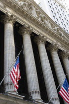 USA, New York, Manhattan, The New York Stock Exchange building in Broad Street beside Wall Street showing the main facade of the building featuring marble sculpture by John Quincy Adams Ward in the pe...