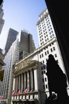 USA, New York, Manhattan, The New York Stock Exchange building in Broad Street beside Wall Street showing the main facade of the building featuring marble sculpture by John Quincy Adams Ward in the pe...