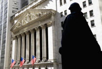 USA, New York, Manhattan, The New York Stock Exchange building in Broad Street beside Wall Street showing the main facade of the building featuring marble sculpture by John Quincy Adams Ward in the pe...