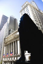 USA, New York, Manhattan, The New York Stock Exchange building in Broad Street beside Wall Street showing the main facade of the building featuring marble sculpture by John Quincy Adams Ward in the pe...