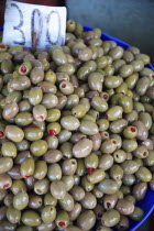 Albania, Tirane, Tirana, Display of stuffed, green olives for sale in the Avni Rustemi Market.