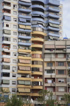 Albania, Tirane, Tirana, Part view of exterior facade of apartment block.