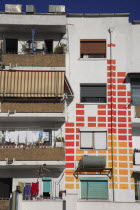 Albania, Tirane, Tirana, Detail of exterior facade of apartment block with pattern painted on walls.