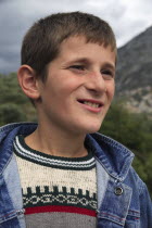 Albania, Kruja, Head and shoulders portait of a teenage boy.