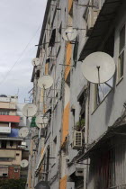 Albania, Tirane, Tirana, satellite dishes on apartment building.