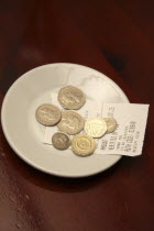 Restaurant, Dining, Bill, A tip left on a dish at a restaurant.