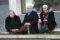 Albania, Tirane, Tirana, Three elderly women sitting together.