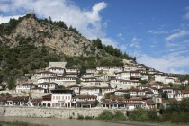 Albania, Berat, Ottoman houses at foot of steep hillside.