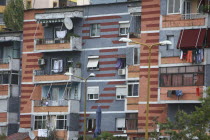 Albania, Tirane, Tirana, colourful apartment building.