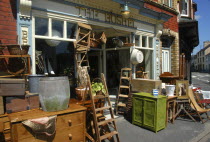 Wales, Articles of furniture for sale outside a Bric-a-Brac shop.