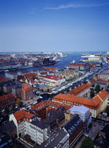 View north over city rooftops and harbour from the tower of the Church of Our Saviour, with the opera house on skyline on right.