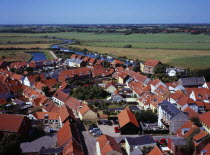 Denmark, Jutland, Ribe, View west over city rooftops towards farmland and the River Ribea from the twelth century Domkirke tower. Ribe is Scandinavias oldest town dating from about 700 AD.