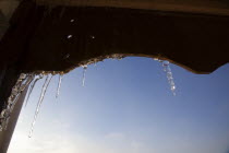 Weather, Winter, Frost, Icicles hanging from household facia panel.