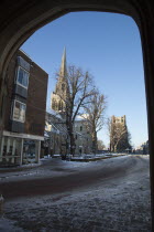 England, West Sussex, Chichester, the Cathedral in snow seen through the arch of the cross.