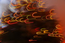 Motion blur of lights on a Christmas tree.