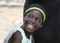 Haiti, La Gonave Island, Young happy smiling girl.