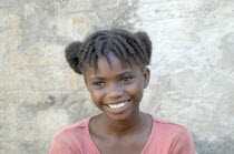 Haiti, La Gonave Island, Young happy smiling girl.