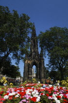 Scotland, Lothian, Edinburgh, Scott monument in Princes street with flower beds in  the foreground.