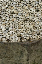 Ireland, Meath, Newgrange,detail of the exterio walls of the historical burial site dating from 3200 BC.