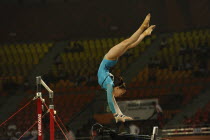 India, Delhi, 2010 Commonwealth Games, Female gymnastics, Asymmetrical bars exercise.