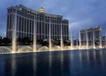 USA, Nevada, Las Vegas, Bellagio hotel and casino on the strip with fountain display in the foreground.