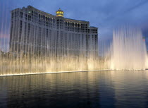 USA, Nevada, Las Vegas, Bellagio hotel and casino on the strip with fountain display in the foreground.