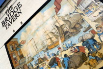 England, Hampshire, Portsmouth, The Camber in Old Portsmouth showing the Bridge Tavern with a mural by Thomas Rowlanson of his cartoon entitled Portsmouth Point.