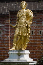 England, Hampshire, Portsmouth, Historic Naval Dockyard Gilded statue of King George III dressed as Roman Emperor.