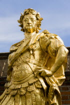 England, Hampshire, Portsmouth, Historic Naval Dockyard Gilded statue of King George III dressed as a Roman Emperor.