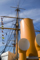 England, Hampshire, Portsmouth, Historic Naval Dockyard Funnels masts and rigging of HMS Warrior built in 1860 as the first iron hulled sail and steam powered warship.