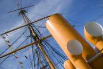 England, Hampshire, Portsmouth, Historic Naval Dockyard Funnels masts and rigging of HMS Warrior built in 1860 as the first iron hulled sail and steam powered warship.