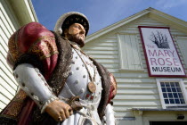 England, Hampshire, Portsmouth, Historic Naval Dockyard Statue of Tudor King Henry VIII outside the Mary Rose Museum of his flagship.