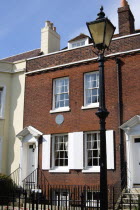 England, Hampshire, Portsmouth, The Charles Dickens Birthplace Museum in Old Commercial Road where he was born in 1812 and lived for three years commemorated with a blue plaque.