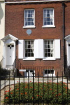 England, Hampshire, Portsmouth, The Charles Dickens Birthplace Museum in Old Commercial Road where he was born in 1812 and lived for three years commemorated with a blue plaque.