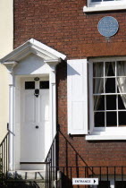 England, Hampshire, Portsmouth, The Charles Dickens Birthplace Museum in Old Commercial Road where he was born in 1812 and lived for three years commemorated with a blue plaque.