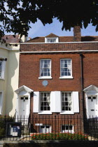 England, Hampshire, Portsmouth, The Charles Dickens Birthplace Museum in Old Commercial Road where he was born in 1812 and lived for three years commemorated with a blue plaque.